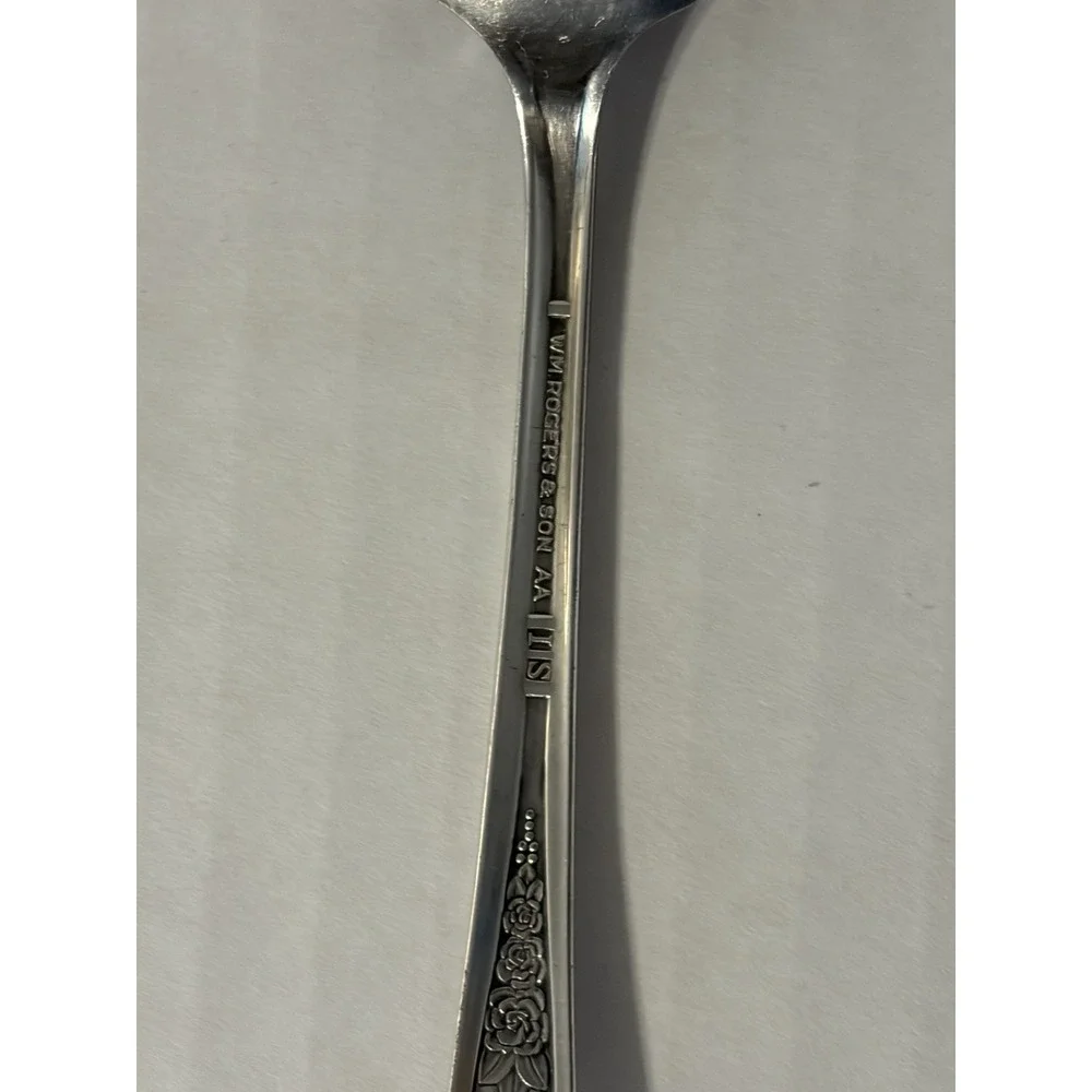 Wm. A Rogers Silver Plated Spoon Floral Decorative Handle Glossy Silver 6 in